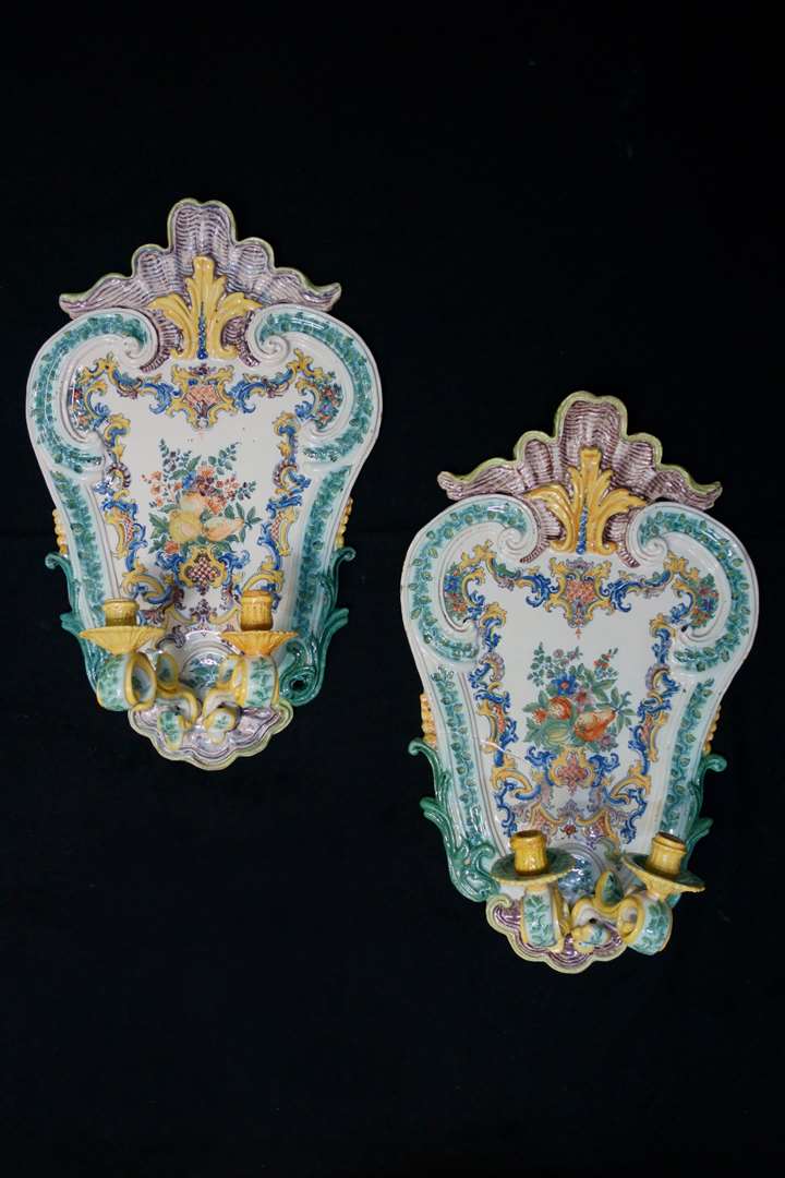 A very important and unique pair of late-Baroque Italian polychrome majolica two- light wall-sconces